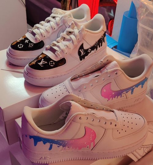 Two pairs of custom painted shoes - Louis Vuitton black Air Force Ones and blue/pink swoosh A1 shoes
